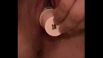 Young girl moans while fucking herself