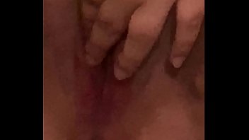 Young girl moans while fucking herself