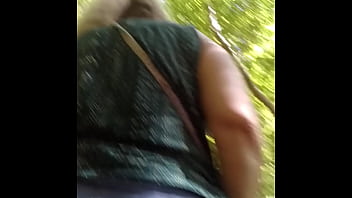 Hot milf giving friend a blowjob in the woods