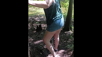 Hot milf giving friend a blowjob in the woods