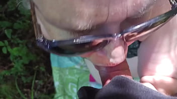 Hot milf giving friend a blowjob in the woods