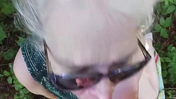 Hot milf giving friend a blowjob in the woods