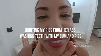 Squirting my piss from her ass teeth wash with cum and piss