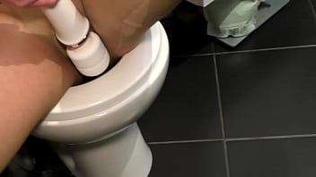 Very very strong pee stream on the wall in pantyhose and high heels