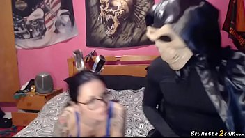 Blue eyed busty brunette playing with the d