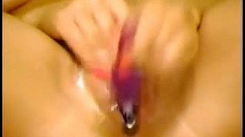 Sexy blonde with great tits rubs pussy and uses dildo