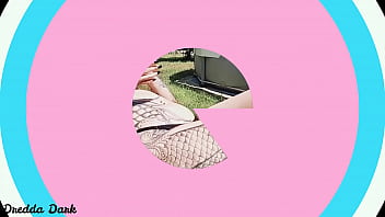 Tattooed horny brunette with big boobs sunbathing in the yard and rubbing sunscreen on her tits