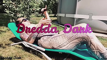 Tattooed Horny Brunette With Big Boobs Sunbathing In The Yard And Rubbing Sunscreen On Her Tits thumbnail