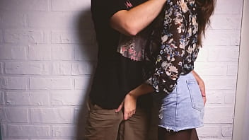 She gives a blowjob to her boyfriend in a sexy blouse and allows him to cum in her mouth