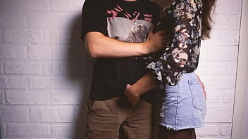 She gives a blowjob to her boyfriend in a sexy blouse and allows him to cum in her mouth