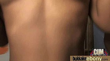 Huge cocks cover their black face in cum 24