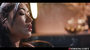 Sexy japanese asian kawaii girl smoking cigarette while touching herself in the pussy