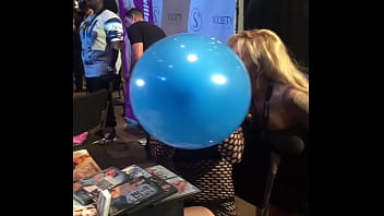 Edyn blair blows up a giant balloon