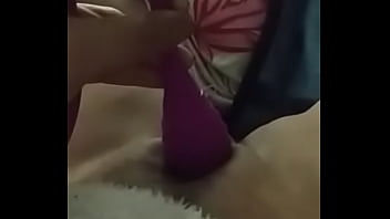 Girlfriend doing herself with a toy