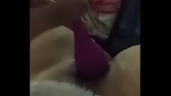 Girlfriend doing herself with a toy