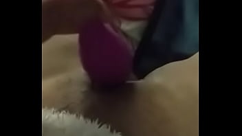 Girlfriend doing herself with a toy