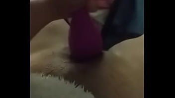 Girlfriend doing herself with a toy