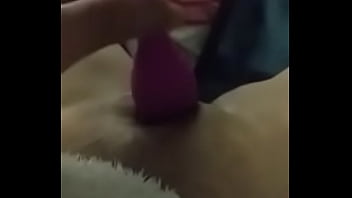 Girlfriend doing herself with a toy