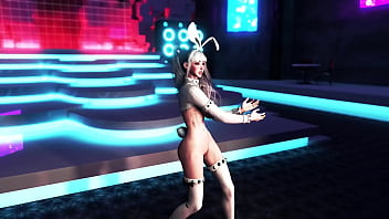 Playful slender girl in revealing outfit dancing on the strip club stage