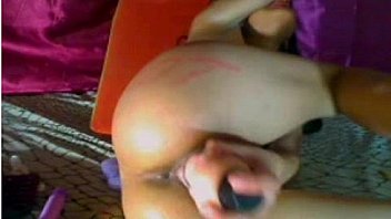 Sexy brunette plays with dildo