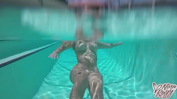 Nina kayy takes her dildo to the pool to fuck herself with it