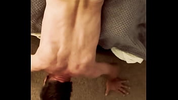 Sneak peak from above stretching in grey briefs on stool and bed
