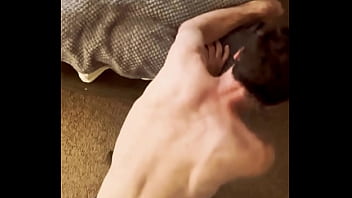 Sneak peak from above stretching in grey briefs on stool and bed