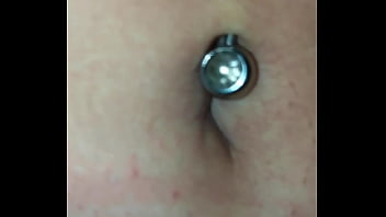 Exploring this sexy belly button with its piercing up close