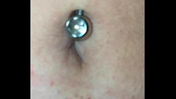 Exploring this sexy belly button with its piercing up close