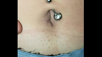 Exploring this sexy belly button with its piercing up close