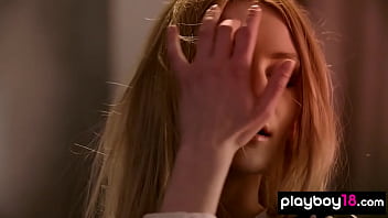 Cute blonde beauty presenting a sensual striptease