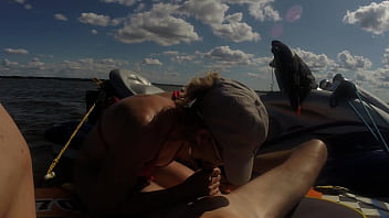 Hot athletic couple have sex on a jetski in the middle of a lake