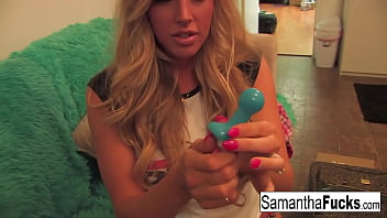 Hot blonde rubs her pussy