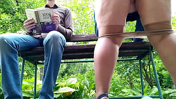 Curvy milf in pantyhose peeing next to me in the park view from below