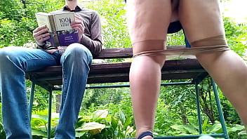 Curvy milf in pantyhose peeing next to me in the park view from below