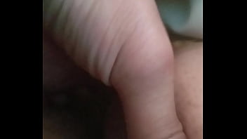 Playing with her pussy