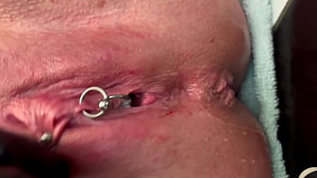 Pierced clit hard rubbing in latex gloves and hard stream pee