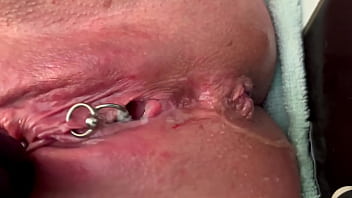 Pierced clit hard rubbing in latex gloves and hard stream pee