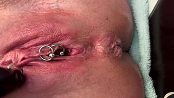 Pierced clit hard rubbing in latex gloves and hard stream pee