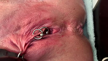 Pierced clit hard rubbing in latex gloves and hard stream pee