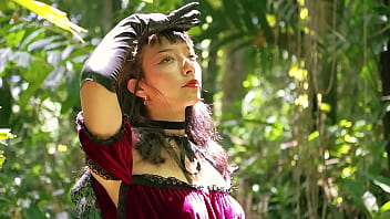 Little red riding hood walking alone in the forest