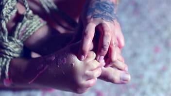 Captive unicorn for foot worship and wax play