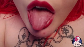 Redhead chubby babe with big tits playing with them