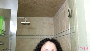 Brunette bombshell enjoys a sensual bath