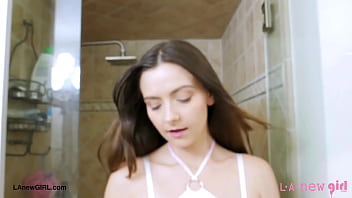 Elegant brunette icon enjoys a sensual bath