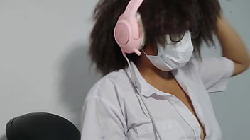 Beautiful student is getting excited while singing while doing homework