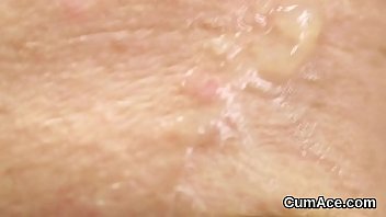 Horny centerfold gets sperm shot on her face sucking all the jism