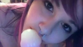 Emo cam girl sucks on her toy