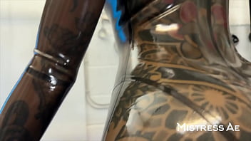 Solo 2 showcasing translucent latex outfit and hankey’s toys strap on