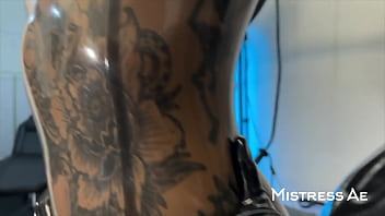 Solo 2 showcasing translucent latex outfit and hankey’s toys strap on